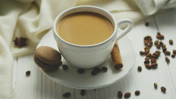 Cup of Coffee with Cookie and Cinnamon