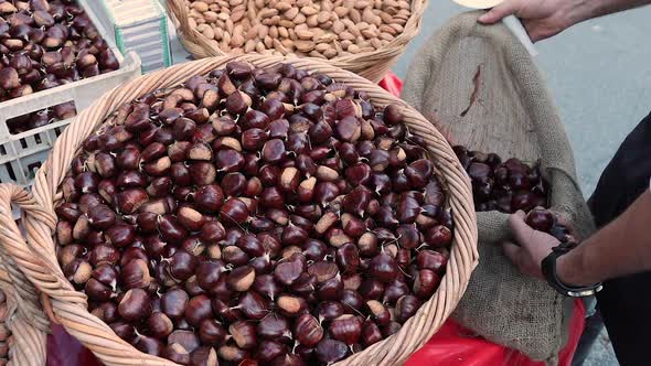 A basket with chestnuts in the market