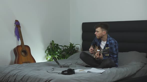 Man plays rock on electric guitar, Music concept