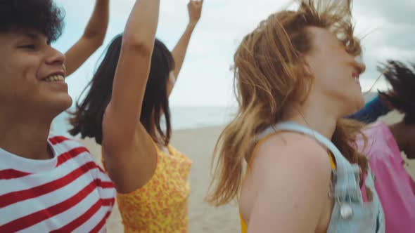 Group of friends having fun on the beach.