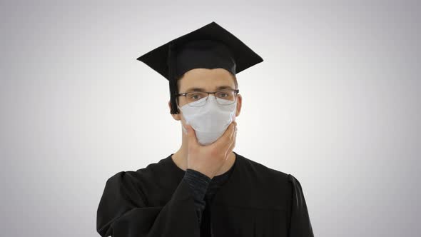 Graduate Student in a Medical Mask Walking on Gradient Background