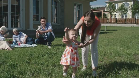 Little Toddler Girl Learning to Walk