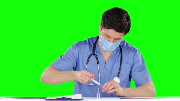 Doctor Is Preparing To Make an Injection. Green Screen