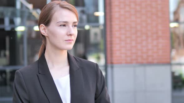 Waiting Young Businesswoman Checking Time on Watch