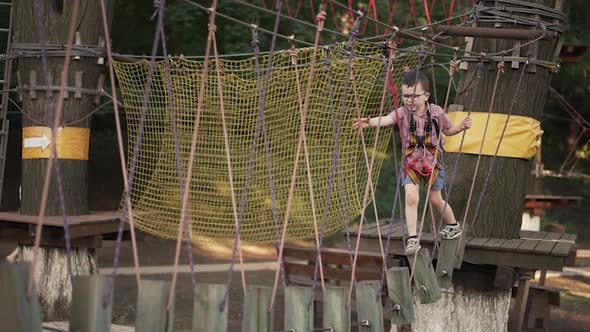 Little Boy at the Rope Park