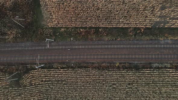 Aerial View of Railway Track Among Agricultural Fields