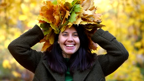 Woman Portrait Put on Maple Leaves Wreath
