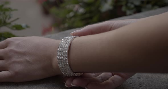 Girl's Hand Showing A Precious Precious Bracelet