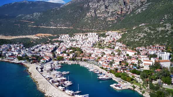 The top view from the drone of Kas resorts, bay, yahts, city in Mugla in Turkey