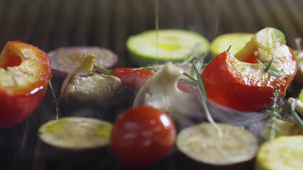 Pouring Oil on Grilled Vegetables