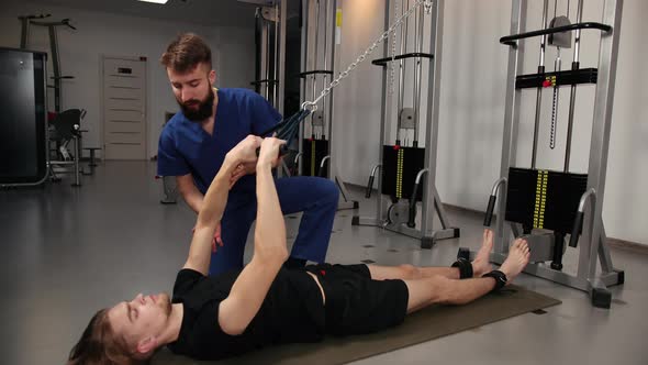 Patient Doing Exercise During Physiotherapy Session in Clinic