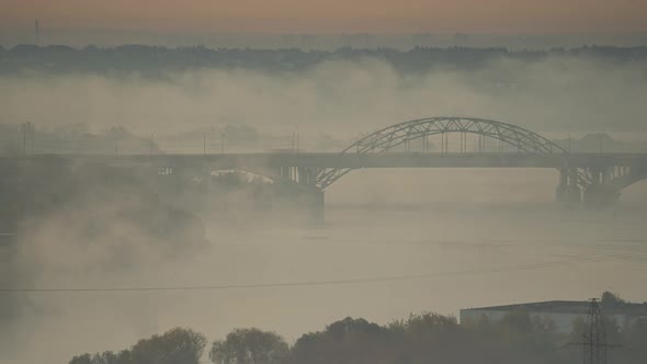 morning autumn fog and bridge