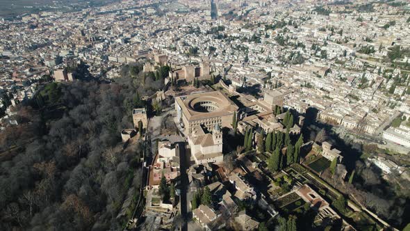 Stunning aerial orbit of Alhambra hilltop palace complex, Granada, Spain