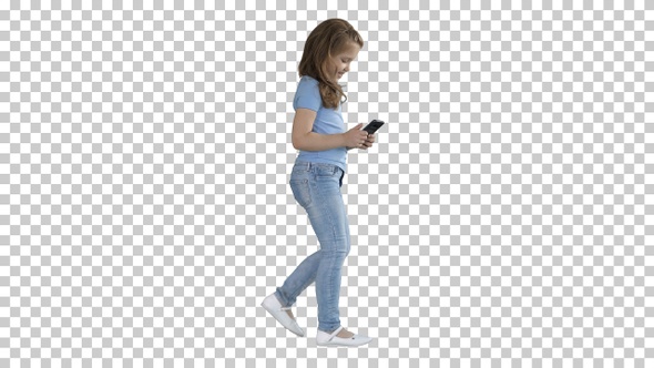 Little girl is playing with smartphone while walking, Alpha Channel
