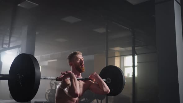 Slow Motion of Crossfit Athlete Performs Clean and Jerk