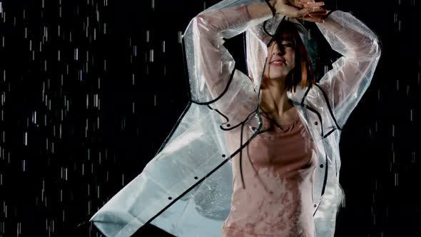 Beautiful Woman Dancing In The Rain