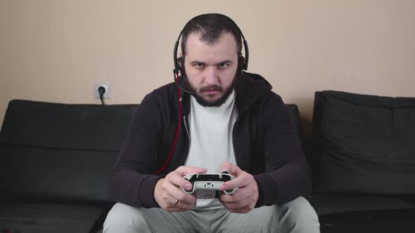 Concentrated Handsome Man Gamer Play Online Strategy Video Game, Loses