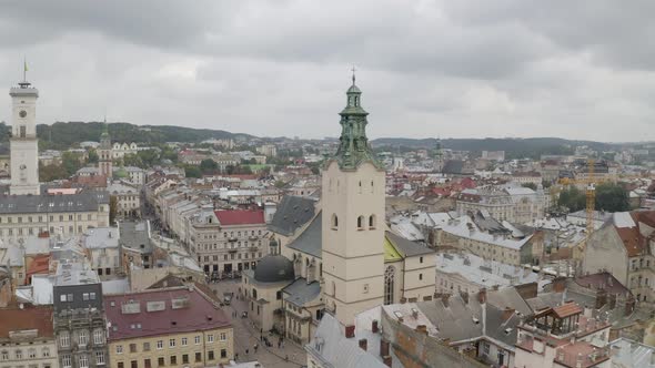 Aerial Drone Video Panorama of Latin Cathedral in City Lviv Ukraine Flight Above Roofs Streets