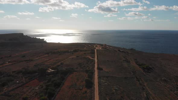 Aerial drone video from northern Malta near the Ghajn Znuber Tower.