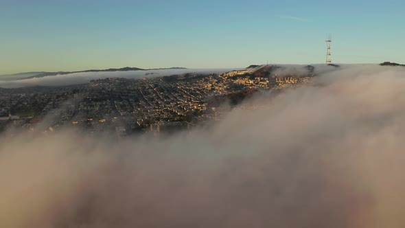 Flying Over San Francisco During Fog and Clouds