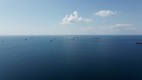 Azure Sea Near the Mountain Shore Are Ships Bulk Carriers