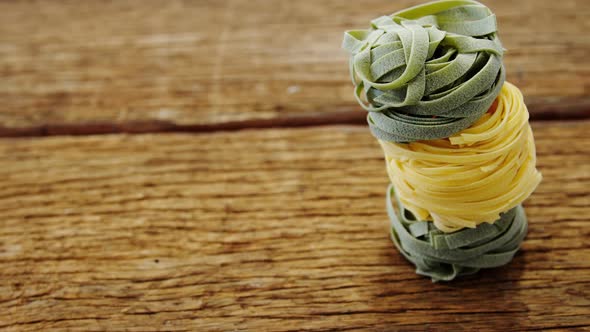 Close-up of green and yellow fettuccine