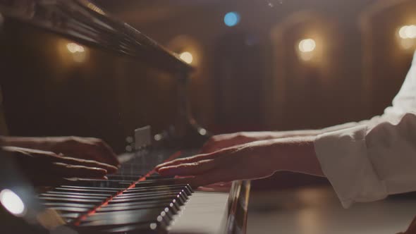 Close Up of Musician Playing Piano