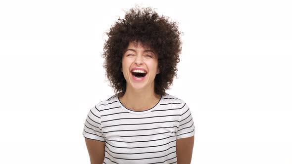 Portrait of Amazing Lovely Mixedrace Female Wearing Stripped Tshirt Bursting with Laughter