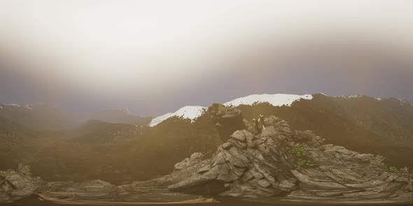 VR 360 Aerial Camera Moving Above Rocks alt
