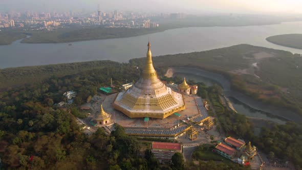 Mumbai, India, "Global Pagoda" temple, 4k aerial drone sunset footage