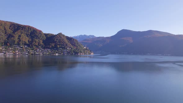 Flying Towards Morcote Municipality of Switzerland on the Shores of Lake Lugano