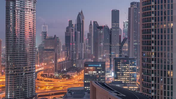 Aerial View of New Skyscrapers and Tall Buildings in Dubai Night to Day Timelapse