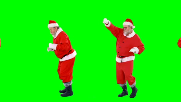 Santa claus dancing and performing various activity