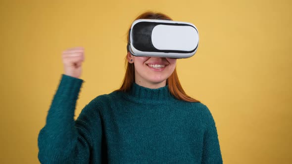 Young Woman Using VR App Headset Helmet