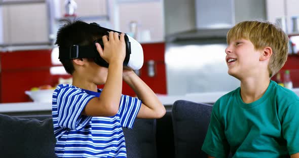 Siblings using virtual reality headset