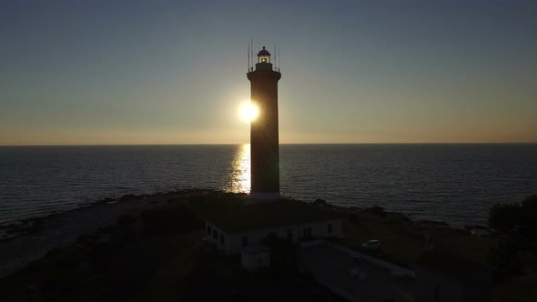 Tracking shot of lighthouse, Croatia at sunset