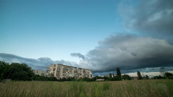 Time Lapse Storm Clouds Pass Over Residential Buildings The Outskirts Of The