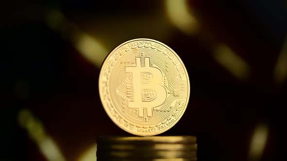 Bitcoin with gold background