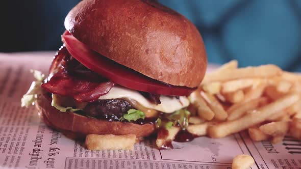 Tasty fresh meat burgers with salad and cheese. Homemade angus burger with salad.