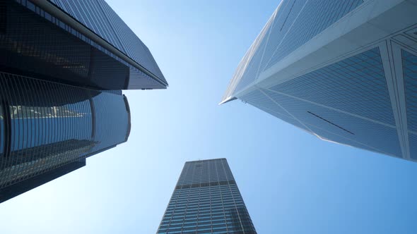 Modern Skyscrapers in Business District Against Blue Sky Global Banking 