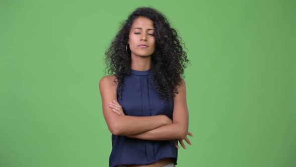 Young Beautiful Hispanic Businesswoman with Arms Crossed