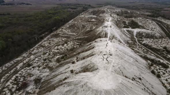 Aerial drone view phosphogypsum white mountains waste from factories