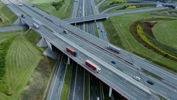 Video Filming From a Drone View of the Road Junction with Cars Moving Along It