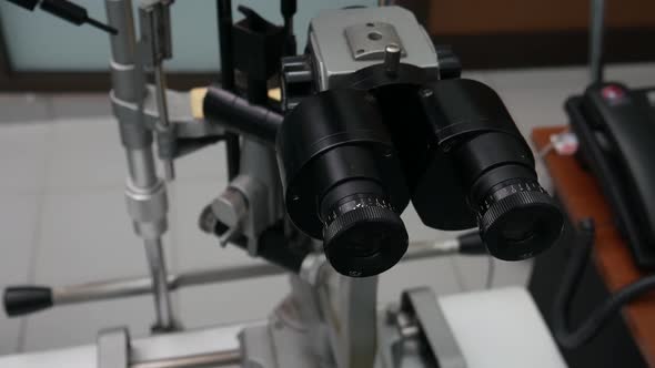 A slit lamp or Biomicroscope is a microscope with a bright light used during an eye exam