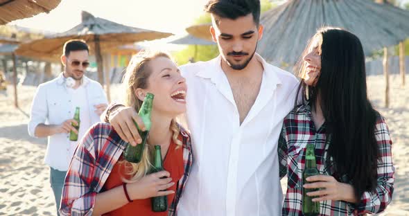 Group of Happy Young People Enjoying Summer Vacation