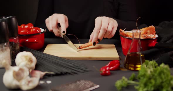 Woman's Hands Prepare Boiled Shrimp for Dinner