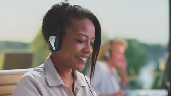 Young woman communicating with client