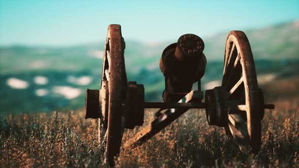 Historic War Gun on the Hill at Sunset