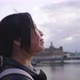 Close up Asian woman standing and seeing beautiful view of river in Sweden - VideoHive Item for Sale