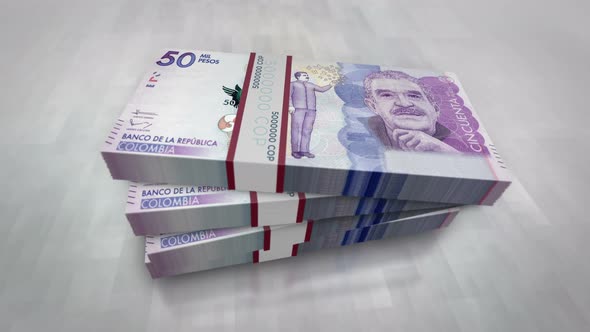 Colombia Pesos money banknote pile packs